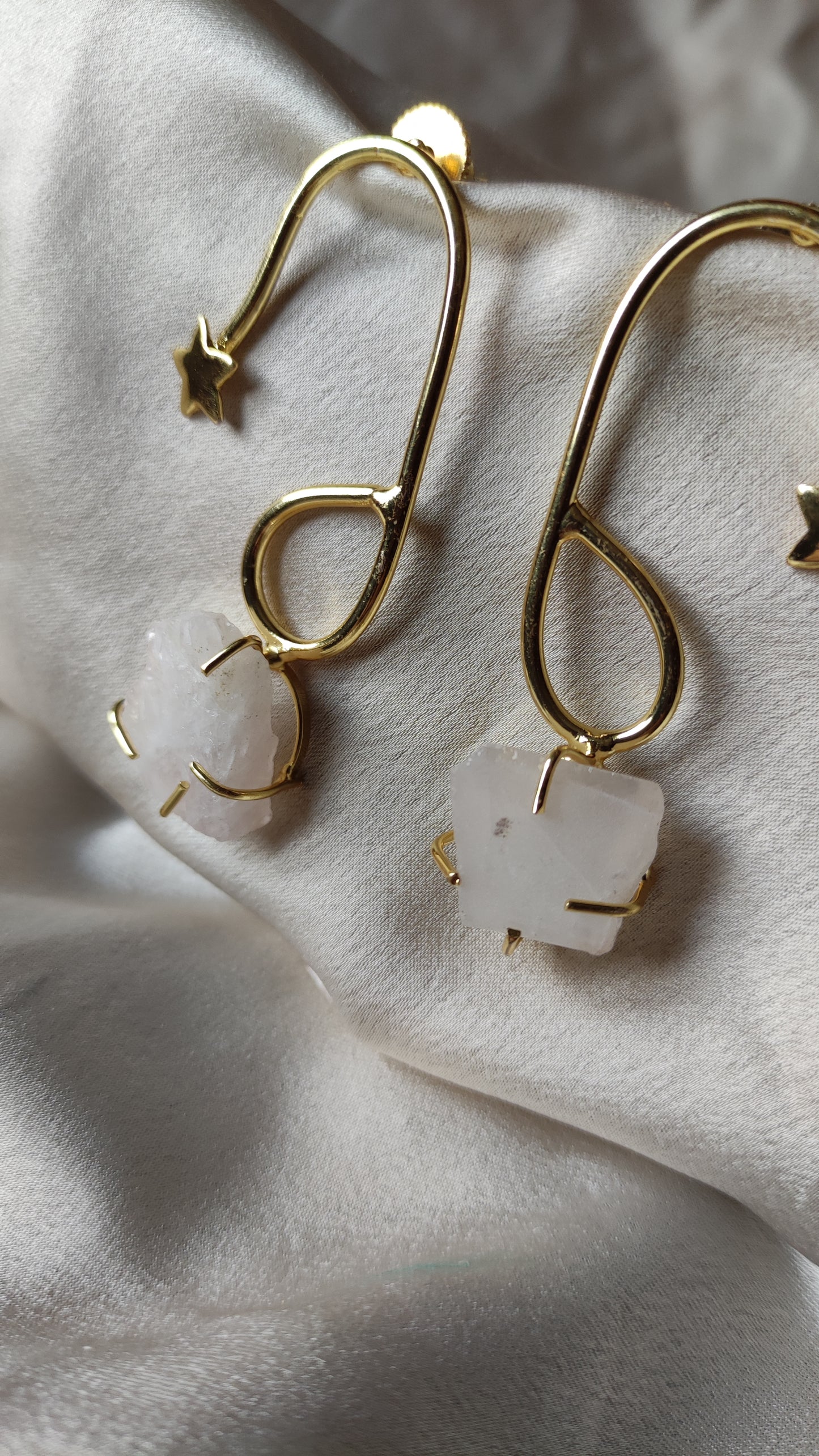 Orecchini stella quarzo bianco