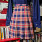 Minigonna tartan in lana a portafoglio