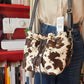 Borsa secchiello in pelle e cavallino
