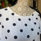 Camicia pois bianca e nera