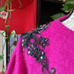 Maglione mohair fuscia con rimani di perline