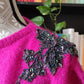 Maglione mohair fuscia con rimani di perline