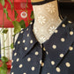 Abito a pois sartoriale