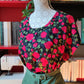 Blusa rose rosse