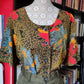 Blusa animalier e fiori
